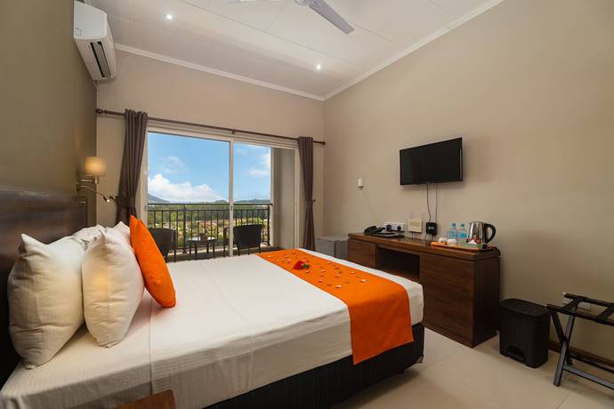 Imagen de la habitación del Hotel The Ridge Residence. Foto 19