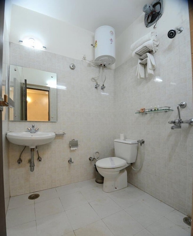 Imagen de la habitación del Hotel The Rigel. Foto 11