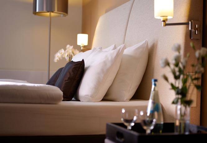 Imagen de la habitación del Hotel The Rilano München. Foto 4