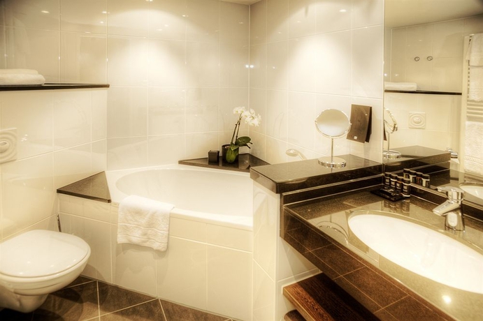 Imagen de la habitación del Hotel The Rilano München. Foto 6