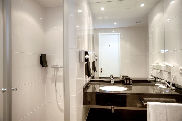 Imagen de la habitación del Hotel The Rilano München. Foto 7