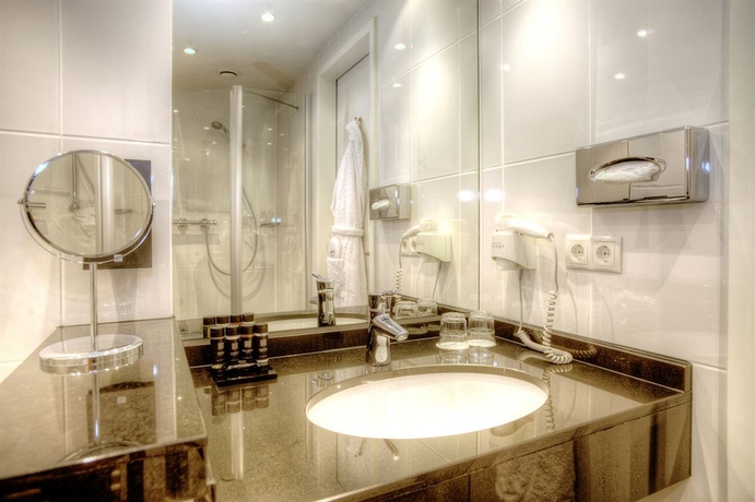 Imagen de la habitación del Hotel The Rilano München. Foto 11