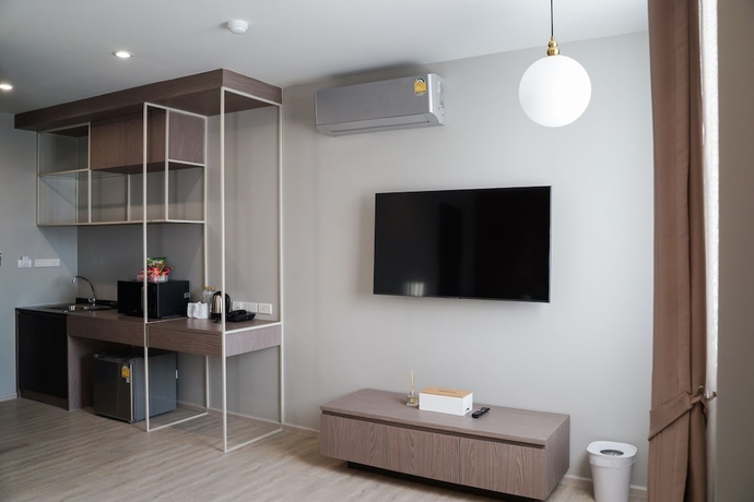 Imagen de la habitación del Hotel The Rise Suites Chiang Mai. Foto 2