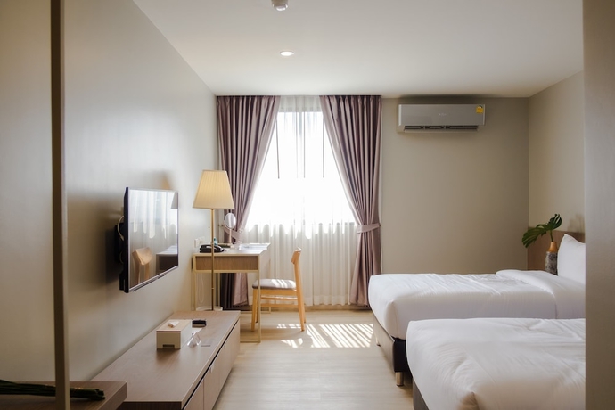 Imagen de la habitación del Hotel The Rise Suites Chiang Mai. Foto 3