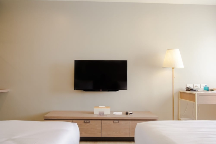 Imagen de la habitación del Hotel The Rise Suites Chiang Mai. Foto 4
