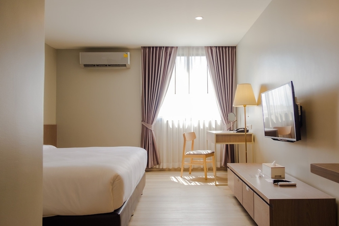 Imagen de la habitación del Hotel The Rise Suites Chiang Mai. Foto 5