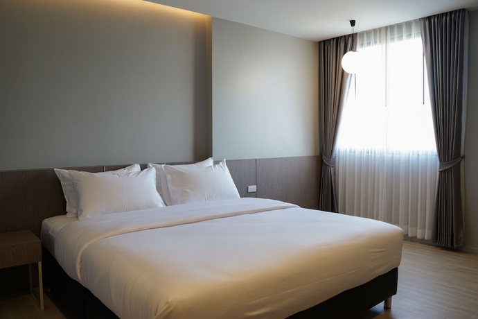 Imagen de la habitación del Hotel The Rise Suites Chiang Mai. Foto 6