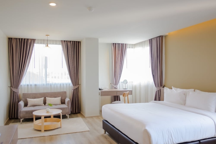 Imagen de la habitación del Hotel The Rise Suites Chiang Mai. Foto 8