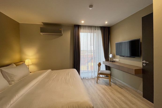 Imagen de la habitación del Hotel The Rise Suites Chiang Mai. Foto 11