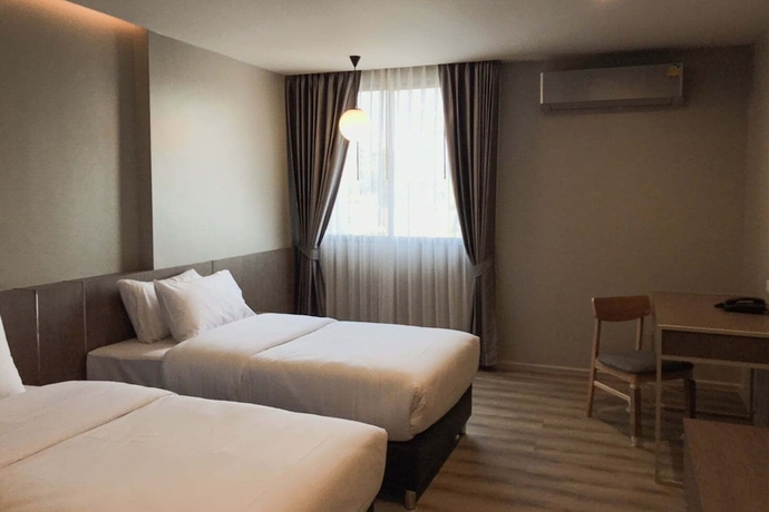 Imagen de la habitación del Hotel The Rise Suites Chiang Mai. Foto 12