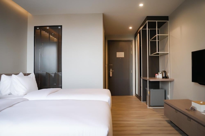 Imagen de la habitación del Hotel The Rise Suites Chiang Mai. Foto 15
