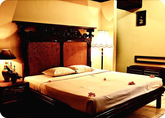 Imagen de la habitación del Hotel The Rishi Candidasa Beach. Foto 6