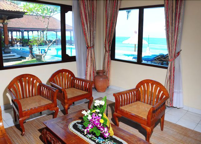 Imagen de la habitación del Hotel The Rishi Candidasa Beach. Foto 9