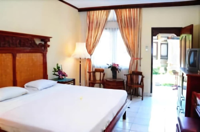 Imagen de la habitación del Hotel The Rishi Candidasa Beach. Foto 12