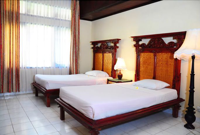 Imagen de la habitación del Hotel The Rishi Candidasa Beach. Foto 13