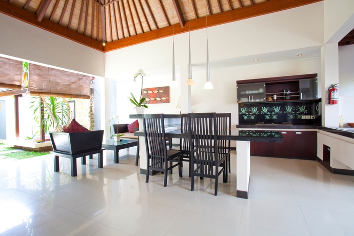 Imagen de la habitación del Hotel The Rishi Villa. Foto 7