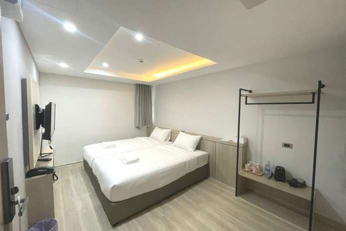 Imagen de la habitación del Hotel The Riski Hotel @ Bangphlat Station SHA. Foto 3
