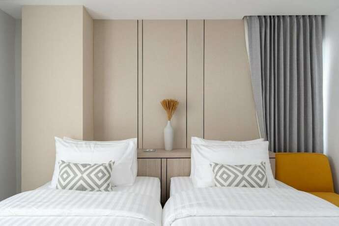 Imagen de la habitación del Hotel The Riski Hotel @ Bangphlat Station SHA. Foto 9