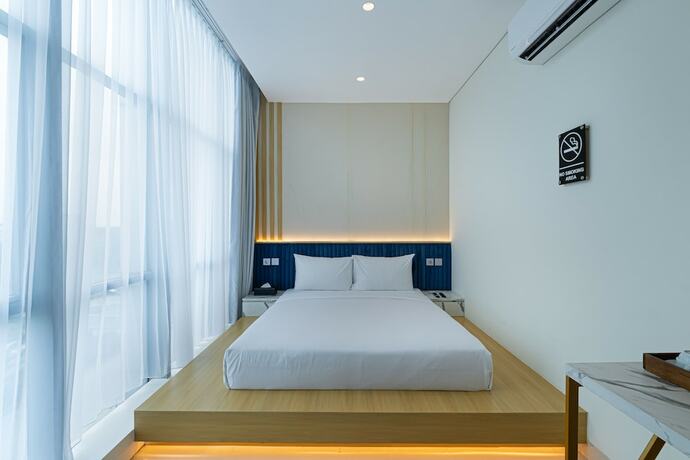 Imagen de la habitación del Hotel The Risman. Foto 15