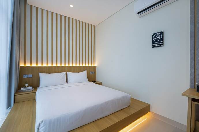 Imagen de la habitación del Hotel The Risman. Foto 16