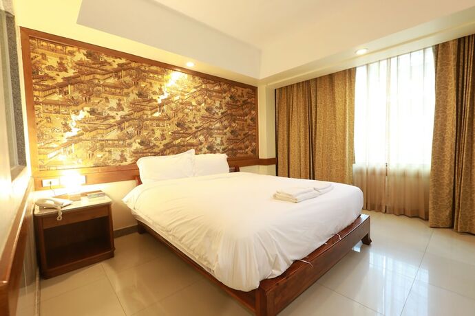 Imagen de la habitación del Hotel The Ritz Boutique Pattaya. Foto 17