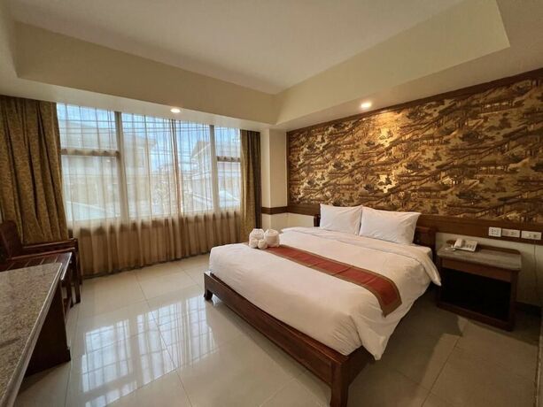 Imagen de la habitación del Hotel The Ritz Boutique Pattaya. Foto 18