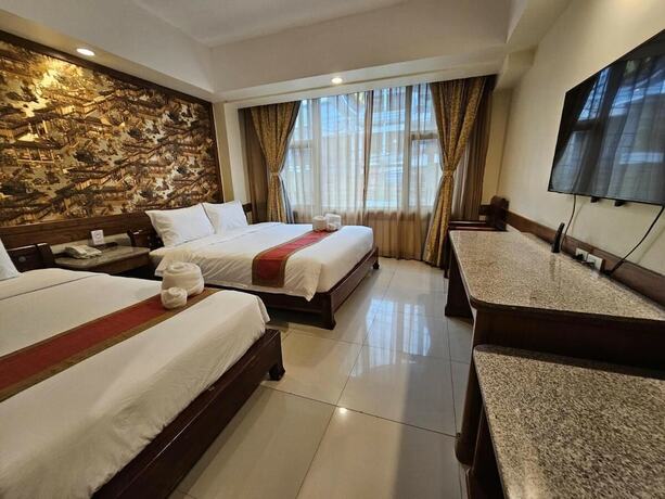 Imagen de la habitación del Hotel The Ritz Boutique Pattaya. Foto 19