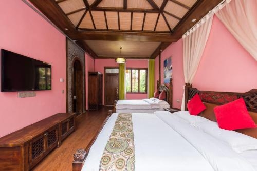 Imagen de la habitación del Hotel The Ritz-man Boutique Inn Lijiang. Foto 10
