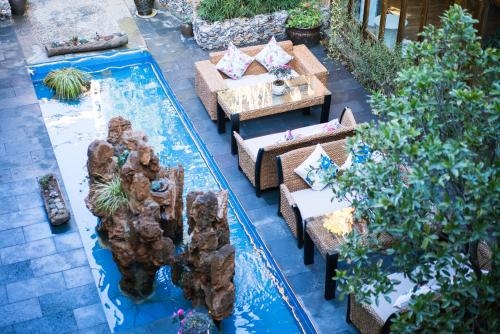 Imagen general del Hotel The Ritz-man Boutique Inn Lijiang. Foto 5