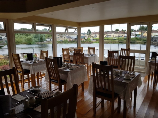 Imagen del bar/restaurante del Hotel The River\'s Edge Guest House. Foto 7