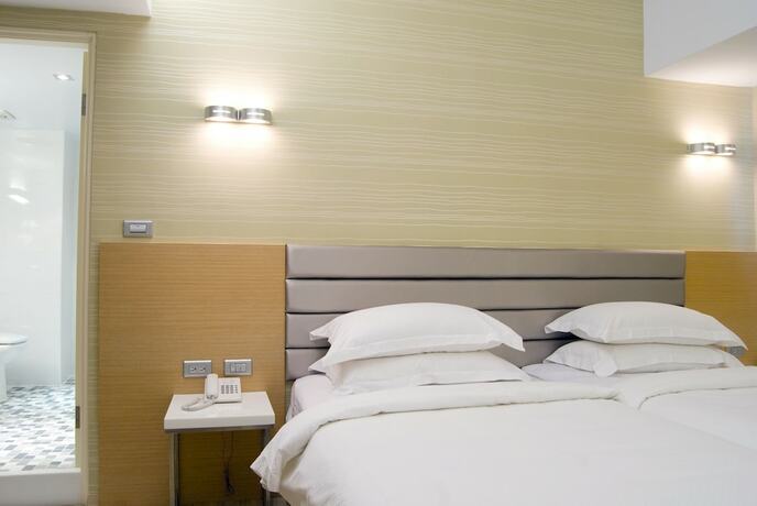 Imagen de la habitación del Hotel The Riverside Esthetics. Foto 11