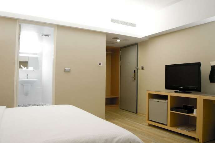 Imagen de la habitación del Hotel The Riverside Esthetics. Foto 12