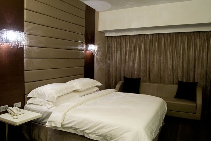 Imagen de la habitación del Hotel The Riverside Esthetics. Foto 17