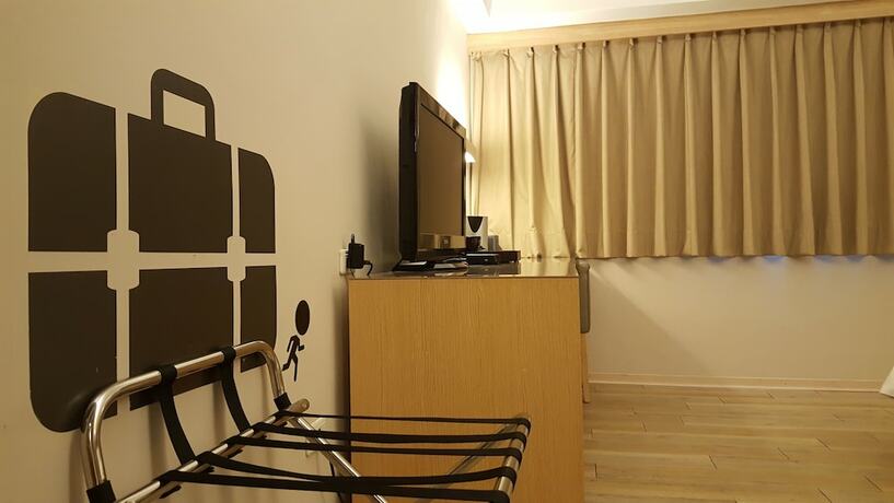 Imagen de la habitación del Hotel The Riverside Esthetics. Foto 20