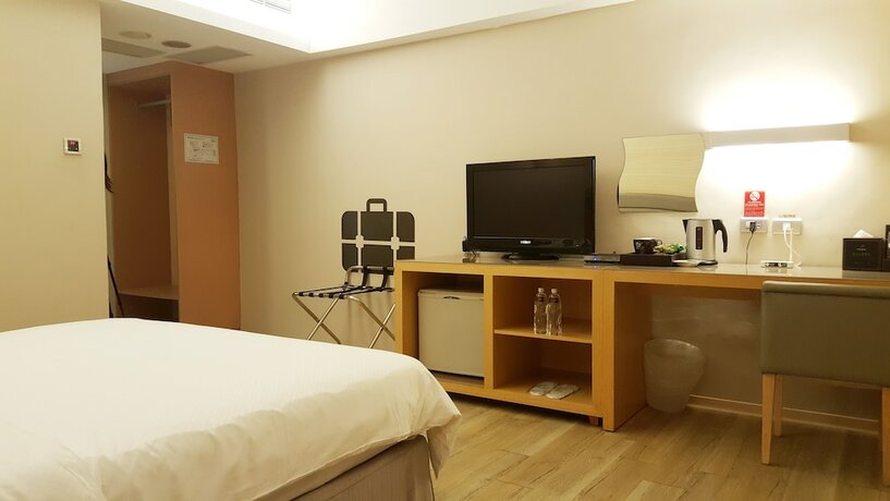 Imagen de la habitación del Hotel The Riverside Esthetics. Foto 23