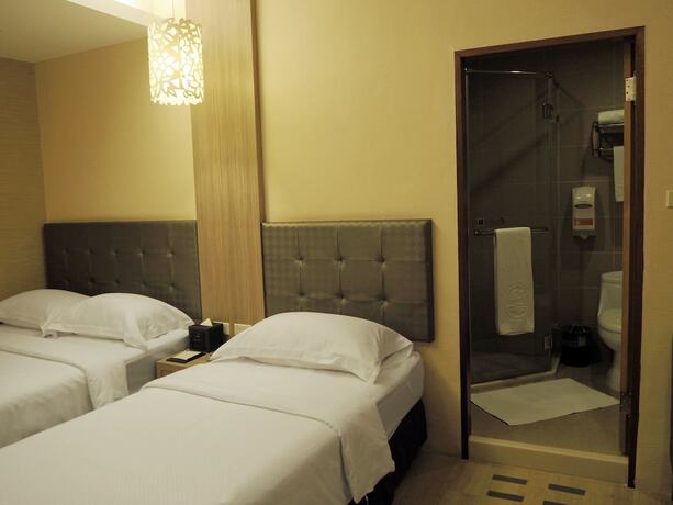 Imagen de la habitación del Hotel The Riverside Hengchun. Foto 11