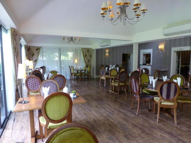 Imagen del bar/restaurante del Hotel The Riverside House. Foto 2