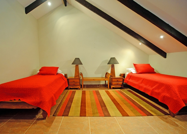 Imagen de la habitación del Hotel The Riverside Inn, Boquete. Foto 8
