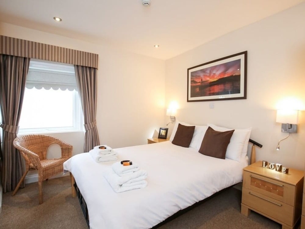 Imagen de la habitación del Hotel The Riviera Guest House. Foto 4