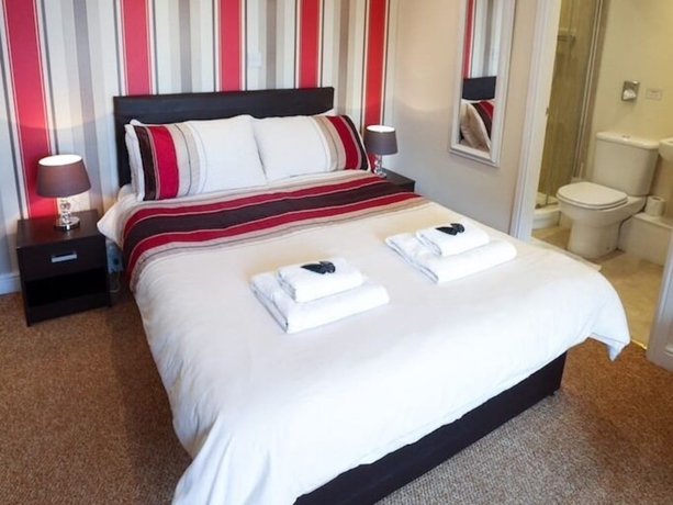 Imagen de la habitación del Hotel The Riviera Guest House. Foto 6