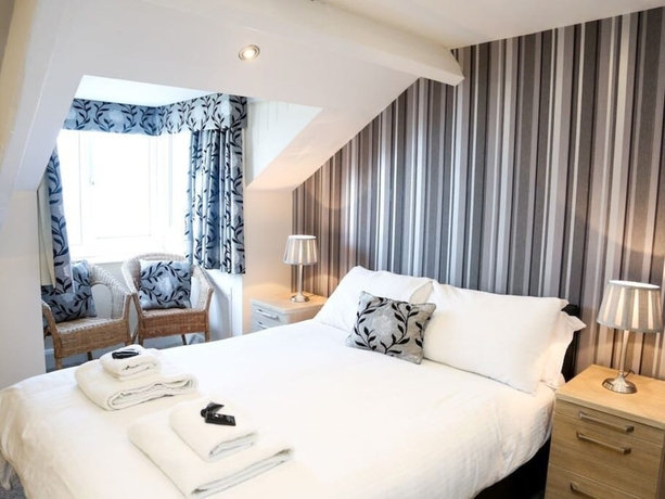 Imagen de la habitación del Hotel The Riviera Guest House. Foto 11
