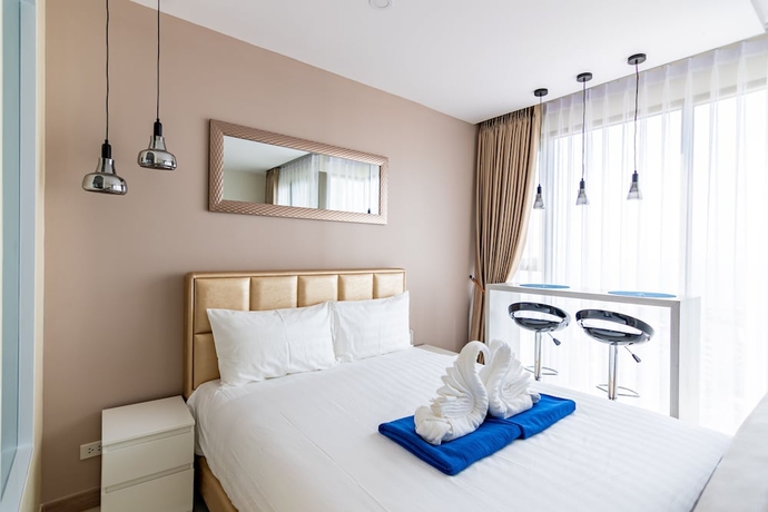 Imagen de la habitación del Hotel The Riviera Jomtien By Pattaya Holiday. Foto 2