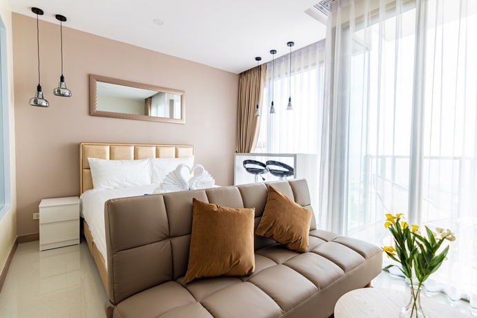 Imagen de la habitación del Hotel The Riviera Jomtien By Pattaya Holiday. Foto 3