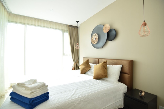 Imagen de la habitación del Hotel The Riviera Jomtien By Pattaya Holiday. Foto 6