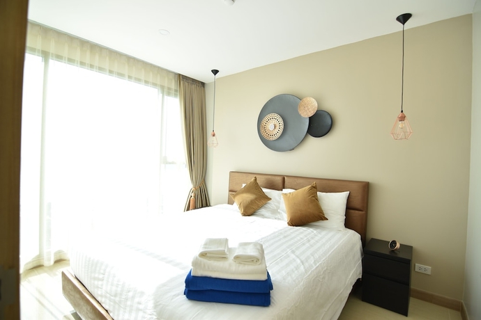 Imagen de la habitación del Hotel The Riviera Jomtien By Pattaya Holiday. Foto 7