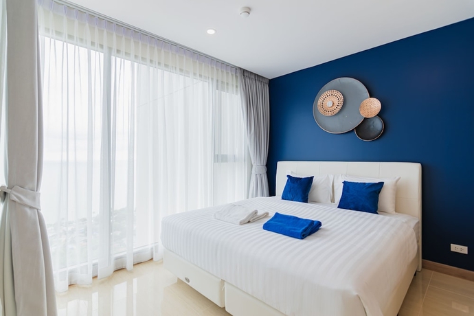 Imagen de la habitación del Hotel The Riviera Jomtien By Pattaya Holiday. Foto 11