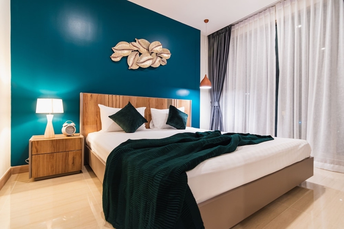 Imagen de la habitación del Hotel The Riviera Jomtien By Pattaya Holiday. Foto 13