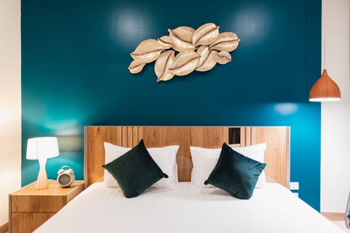 Imagen de la habitación del Hotel The Riviera Jomtien By Pattaya Holiday. Foto 14