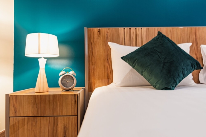 Imagen de la habitación del Hotel The Riviera Jomtien By Pattaya Holiday. Foto 17