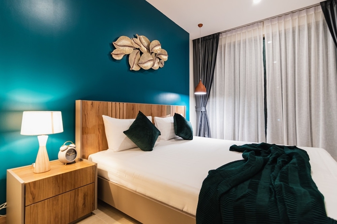 Imagen de la habitación del Hotel The Riviera Jomtien By Pattaya Holiday. Foto 18